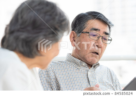 Senior couple open cafe wheelchair 84585024