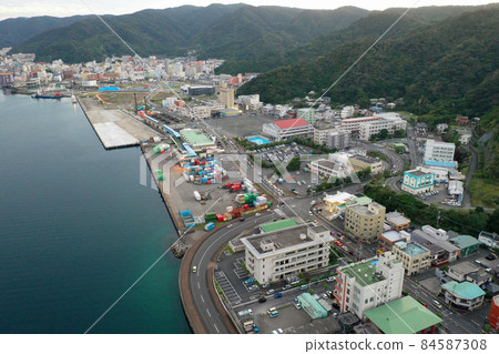 Aerial view of Naze city at dusk 84587308