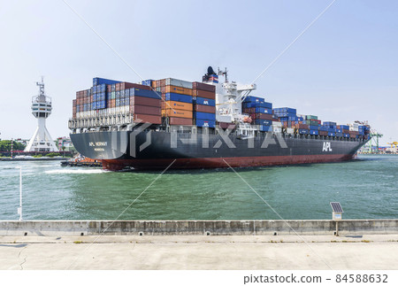The container ship is sailing into the Port of Kaohsiung, Taiwan. 84588632