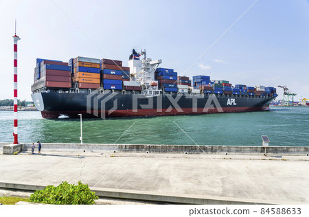 The container ship is about to dock at the port of Kaohsiung, Taiwan 84588633