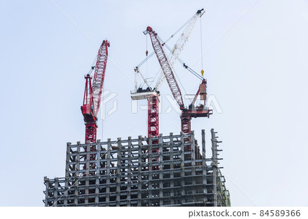 View of the building construction site with cranes in Taiwan. View of the building construction site with cranes in Taiwan. 84589366