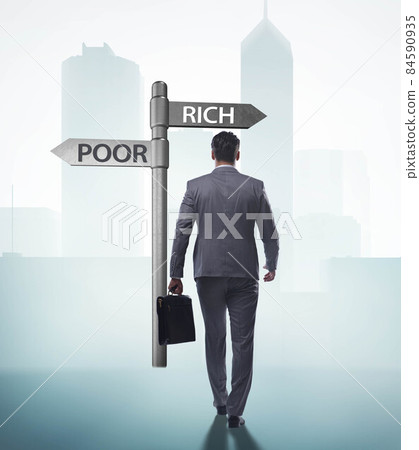 Businessman in difficult choice concept 84590935