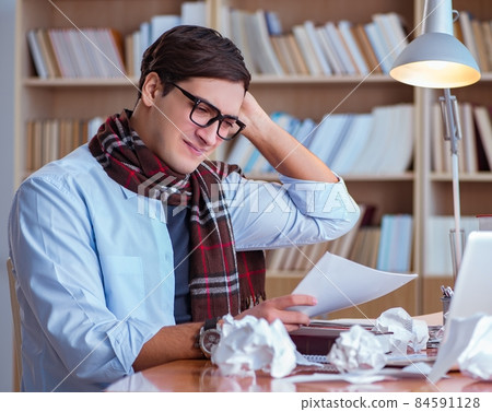 Young book writer writing in library Young book writer writing in library 84591128