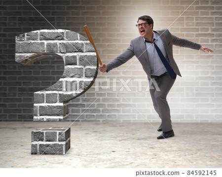Angry man with baseball bat hitting question mark 84592145