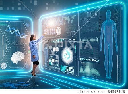 Woman doctor in futuristic medical concept Woman doctor in futuristic medical concept 84592148