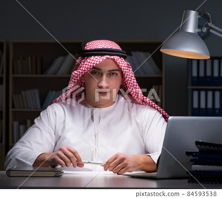 Arab businessman working late in office 84593538