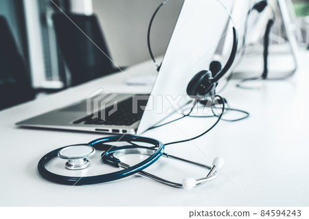 Headset and doctor equipment at clinic ready for actively support for patient Headset and doctor equipment at clinic ready for actively support for patient 84594243