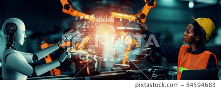 Mechanized industry robot and human worker working together in future factory 84594683