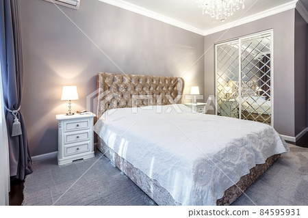 luxury hotel bedroom. Bed with carriage coupler headboard luxury hotel bedroom. Bed with carriage coupler headboard 84595931