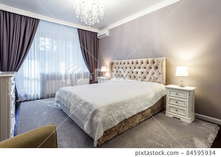 luxury hotel bedroom. Bed with carriage coupler headboard luxury hotel bedroom. Bed with carriage coupler headboard 84595934