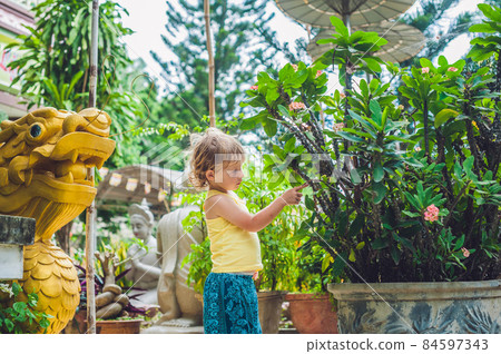Boy tourist in Buddhist temple in Vietnam Nha Trang 84597343