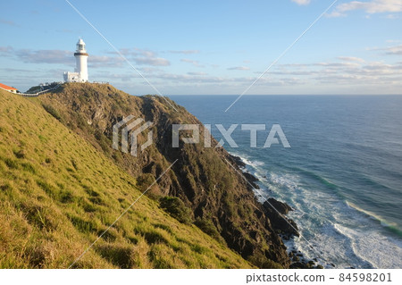 Cape Byron Lighthouse on the easternmost tip of the continent where you can see the earliest sunrise on the Australian continent 84598201