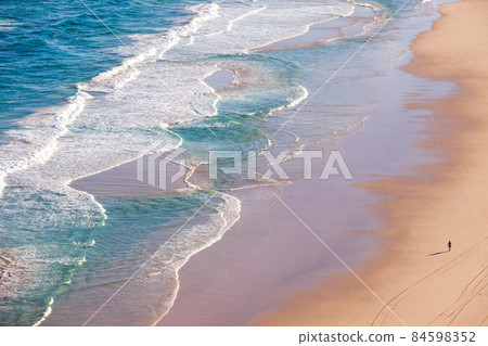 Tallow Beach in Byron Bay, the easternmost cape of the continent where you can see the earliest sunrise on the Australian continent 84598352