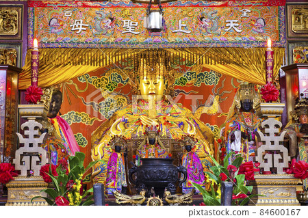 The main hall of the Great Mazu Temple in Tainan, Taiwan, enshrines a statue of Mazu. the Mazu is deified form of the medieval Fujianese shamaness Lin Moniang. 84600167