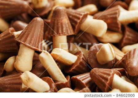 Dessert background Chocolate mushrooms cookies as texture. Dessert background Chocolate mushrooms cookies as texture. 84602000