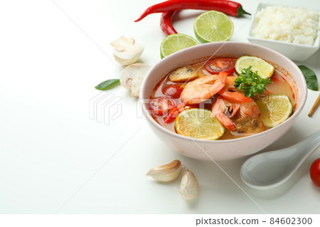 Tom yum soup and ingredients on white background 84602300