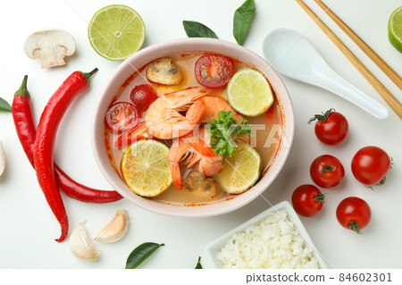 Tom yum soup and ingredients on white background 84602301