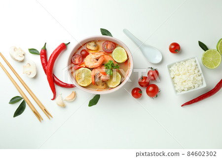 Tom yum soup and ingredients on white background 84602302