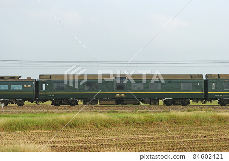 Hokuriku Main Line Mikawa-Kaga-Kasama JR West 24 series Twilight 2nd formation ⑧ Slone 25-502 sea side 84602421