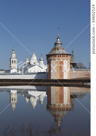 Reflection Prilutsk Saviour Monastery in Vologda river Reflection Prilutsk Saviour Monastery in Vologda river 84602524