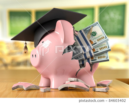 Piggy bank with money and graduation cap in a classroom. Savings or investment in education fund 84603402