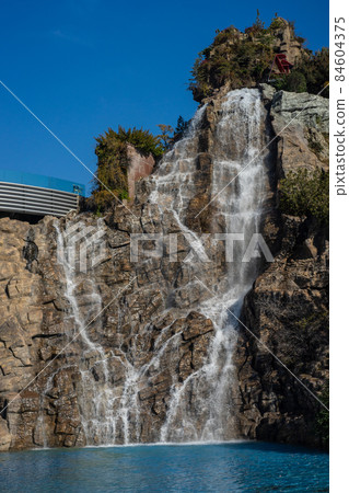 Waterfall with stream running river Waterfall with stream running river 84604375