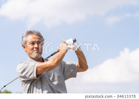 Senior men playing golf Senior men playing golf 84613378