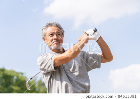 Senior men playing golf Senior men playing golf 84613381