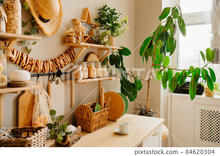 kitchen is made of wood with elements of eco style. hat and bagels kitchen is made of wood with elements of eco style. hat and bagels 84620304