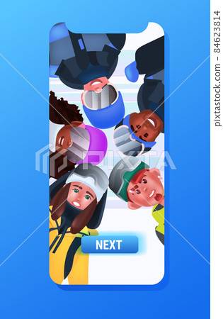 mix race skiers looking in smartphone camera tourists skiing doing activities winter vacation concept 84623814