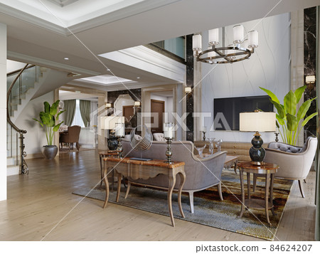 Living area in a large two-story house with luxurious quilted furniture side tables and a decorated console. 84624207