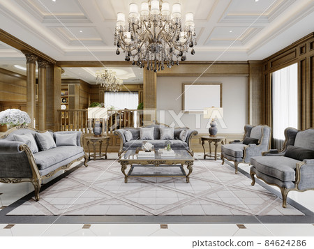 Classic living room with gray furnishings and carved patterned wood walls. Classic living room with gray furnishings and carved patterned wood walls. 84624286
