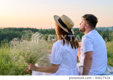 Beautiful romantic adult couple looking at the horizon, nature copy space 84627426