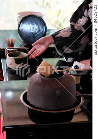 Tea ceremony in front of you Tea ceremony in front of you 84628423
