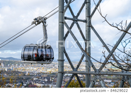 A view of Koblenz, Germany, from the Ehrenbreitstein castle. The cable car line connects the German corner with the castle A view of Koblenz, Germany, from the Ehrenbreitstein castle. The cable car line connects the German corner with the castle 84629022