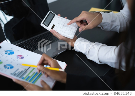 Businessman and Accountant brainstorming or discussing about fund investment and finance. 84631143