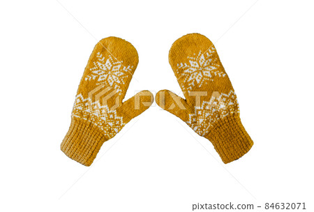 pair of yellow orangeknitted mittens with christmas pattern isolated on pair of yellow orangeknitted mittens with christmas pattern isolated on 84632071