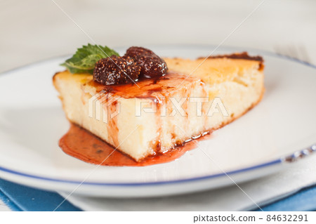 Cottage cheese casserole with strawberry jam 84632291