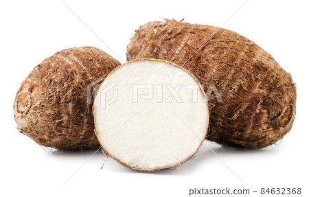 Tarot root whole and half on white background. Isolated eddo root Tarot root whole and half on white background. Isolated eddo root 84632368