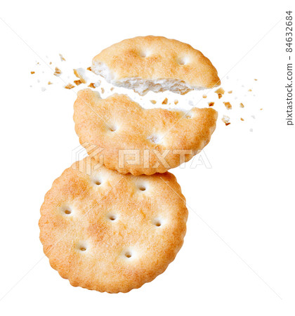 falling broken crackers with crumbs isolated on white 84632684