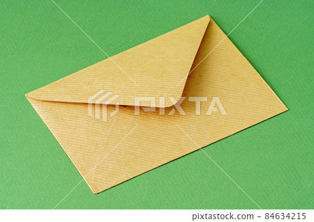 Envelope on green background 84634215