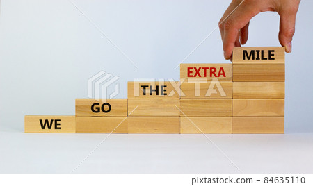 Live to tell the tale symbol. Wooden blocks stacking as step stair on beautiful white background, copy space. Businessman hand. Words 'live to tell the tale'. Business and live to tell the tale Live to tell the tale symbol. Wooden blocks stacking as step stair on beautiful white background, copy space. Businessman hand. Words 'live to tell the tale'. Business and live to tell the tale 84635110