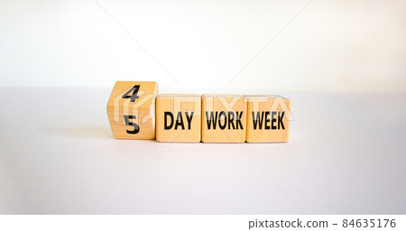 4 or 5 day work week symbol. Turned the cube and changed words '5 day work week' to '4 day work week'. Beautiful white background. Copy space. Business and 4 or 5 day work week concept. 4 or 5 day work week symbol. Turned the cube and changed words '5 day work week' to '4 day work week'. Beautiful white background. Copy space. Business and 4 or 5 day work week concept. 84635176
