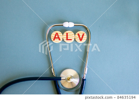 COVID-19 Pandemic Coronavirus concept. Wooden circles with the inscription ALV and stethoscope. 84635194