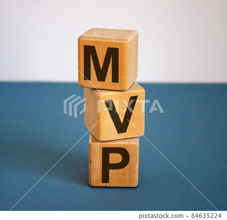 Concept word 'MVP' on cubes on a beautiful blue background. Business concept. Concept word 'MVP' on cubes on a beautiful blue background. Business concept. 84635224
