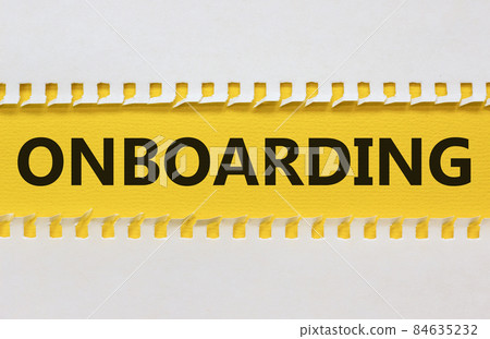 Onboarding success symbol. White and yellow paper with the word Onboarding on beautiful yellow background. Business and onboarding success concept. Copy space. Onboarding success symbol. White and yellow paper with the word Onboarding on beautiful yellow background. Business and onboarding success concept. Copy space. 84635232