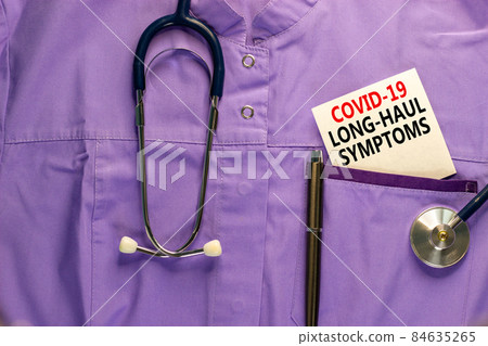 COVID-19 long-haul covid symptoms symbol. White card with words Covid-19 long-haul symptoms. Medical uniform, metalic pen and stethoscope. Medical, COVID-19 long-haul covid symptoms concept. COVID-19 long-haul covid symptoms symbol. White card with words Covid-19 long-haul symptoms. Medical uniform, metalic pen and stethoscope. Medical, COVID-19 long-haul covid symptoms concept. 84635265