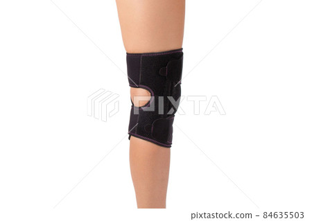 Knee Support Brace on leg isolated on white background. Orthopedic Anatomic. Braces for knee fixation, injuries and pain. Knee Joint Bandage Sleeve. Elastic Sports. Knee Support Brace on leg isolated on white background. Orthopedic Anatomic. Braces for knee fixation, injuries and pain. Knee Joint Bandage Sleeve. Elastic Sports. 84635503