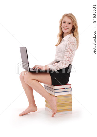 Happy student teenage girl with laptop Happy student teenage girl with laptop 84636531