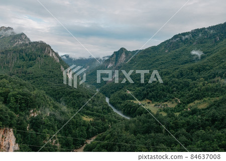 Tara River, view from the bridge, north Montenegro. Canyon of river Tara, deepest canyon in the Europe, second in the world. State of Montenegro Tara River, view from the bridge, north Montenegro. Canyon of river Tara, deepest canyon in the Europe, second in the world. State of Montenegro 84637008